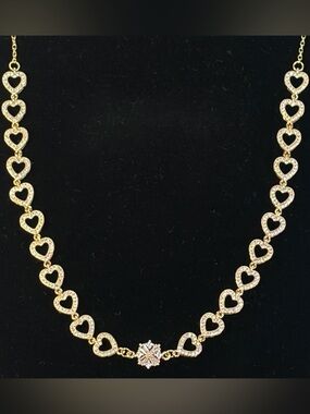 Gold heart link Necklace.Micro paved CZ hearts and floral centerpiece.